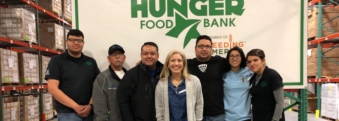 Team members volunteering in El Paso food bank