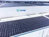 Lineage warehouse facility with array of solar panels.